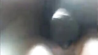 A beautiful black girl caresses herself, showcasing her juicy and wet homemade charm