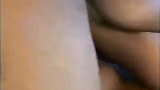 An Asian whore licks the huge black cock of her client