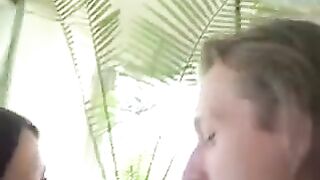 A camera is hidden under the table to shoot a girl without panties