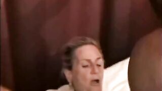 A mature woman is having sex with a black guy’s big cock