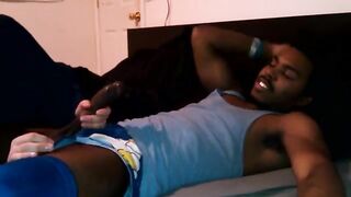Black girl gives a blowjob to her white boyfriend on the bed