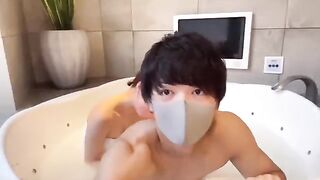 Japanese guy’s slippery handjob with lotion ends with powerful cumshot