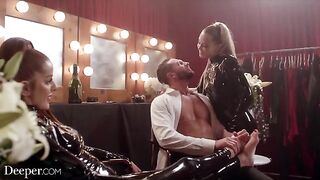 Avery and Vanna are having a threesome while wearing latex in a sensual scene