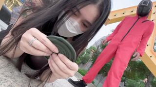 A hot Chinese girl is playing a squid game with her boyfriend