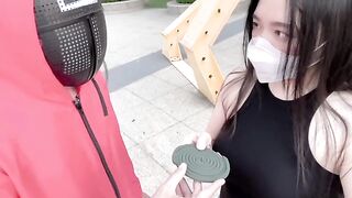 A hot Chinese girl is playing a squid game with her boyfriend