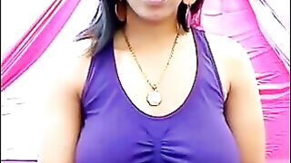 Her nipples are standing through a T-shirt because she's too excited