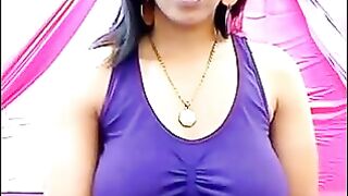 Her nipples are standing through a T-shirt because she's too excited