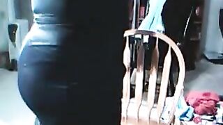 The guy gets excited while wearing a dress of a girl