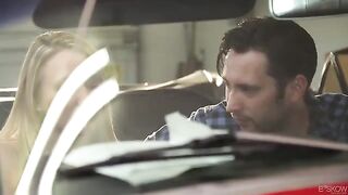 A red convertible car is the setting for passionate and intimate sex