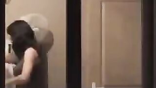 Guy admires his reflection in the mirror completely naked