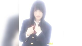A Japanese school uniform is worn by a cute Asian girl during solo masturbation