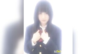 A Japanese school uniform is worn by a cute Asian girl during solo masturbation