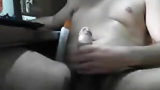 A guy who sits in front of the computer and masturbates with his dick
