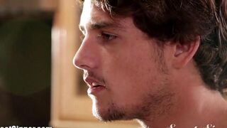 Sexy brunette makes a blowjob right in the bedroom