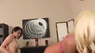 Two hot lesbian beauties with sexy skirts and vibrators