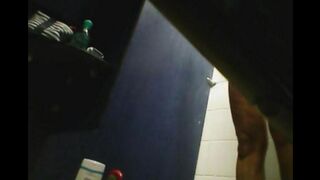 A hidden camera in the shower captures a girl's intimate moment