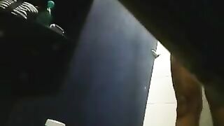 A hidden camera in the shower captures a girl's intimate moment