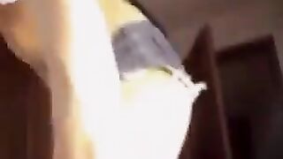 Russian webcam girl with natural boobs gets undressed and caresses them