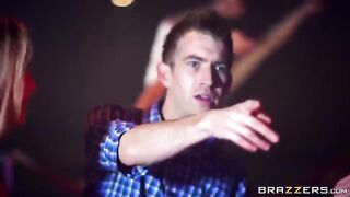 A blonde is having fun with a guy at the party