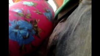 A man has a riser and caresses girls on the bus