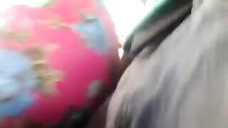 A man has a riser and caresses girls on the bus