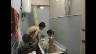A sister gets fucked by her brother in the bathroom with a hidden camera
