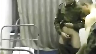 A chick is fucking with soldiers in the crowd, right in the barracks