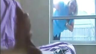 A woman spies on a guy who is jerking off in the ward