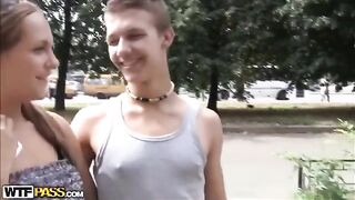The man stuck his tongue between the panties of two hot beauties