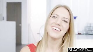 Blonde girl has sex with a black man with a big cock
