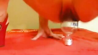 Bottle fisting and anal play with a large dildo, just like in the eporn scenes