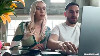 A blonde was cutting pictures and printing them on her couch