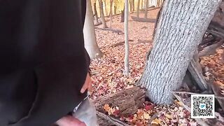 A couple enjoys outdoor intimacy in the park
