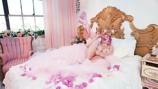 A woman with a glamorous lifestyle loves to play with toys