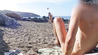 Nude beauties got acquainted with a guy who caressed his cock on the beach