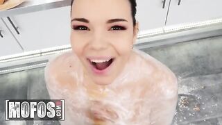 A hot brunette with big tits, Sofia Lee, helps in the kitchen
