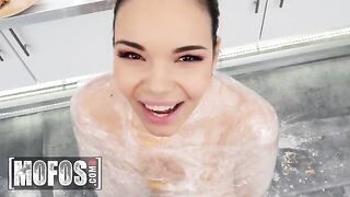 A hot brunette with big tits, Sofia Lee, helps in the kitchen
