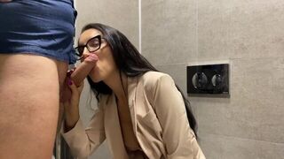 A couple has sex right in the office booth