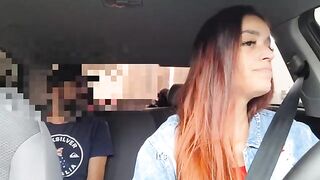 The girl noticed the guy's cock through his pants in the car