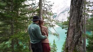 A couple making love outdoors in the forest, with intimate connection