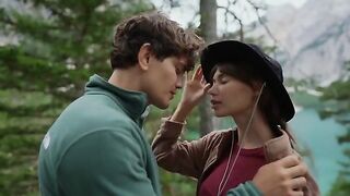 A couple making love outdoors in the forest, with intimate connection