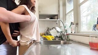A nice lady has sex with her husband in the kitchen