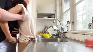A nice lady has sex with her husband in the kitchen