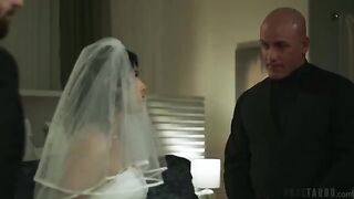 A brunette with a tattoo gets fucked on the bed in doggystyle