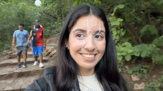 A beautiful girl made a cumshot on her face in the park