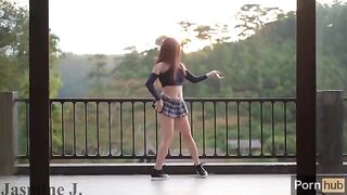 A sexy girl Jasmine J pees and squirts like a fountain on the balcony